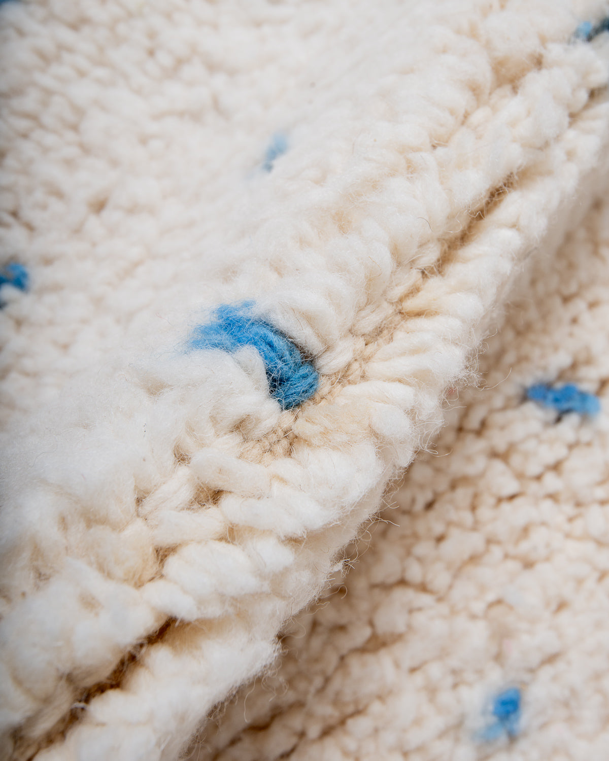 Modern, designer, handcrafted Berber rug from Morocco. Beniourain carpet with beautiful colours and patterns and fluffy wool texture.